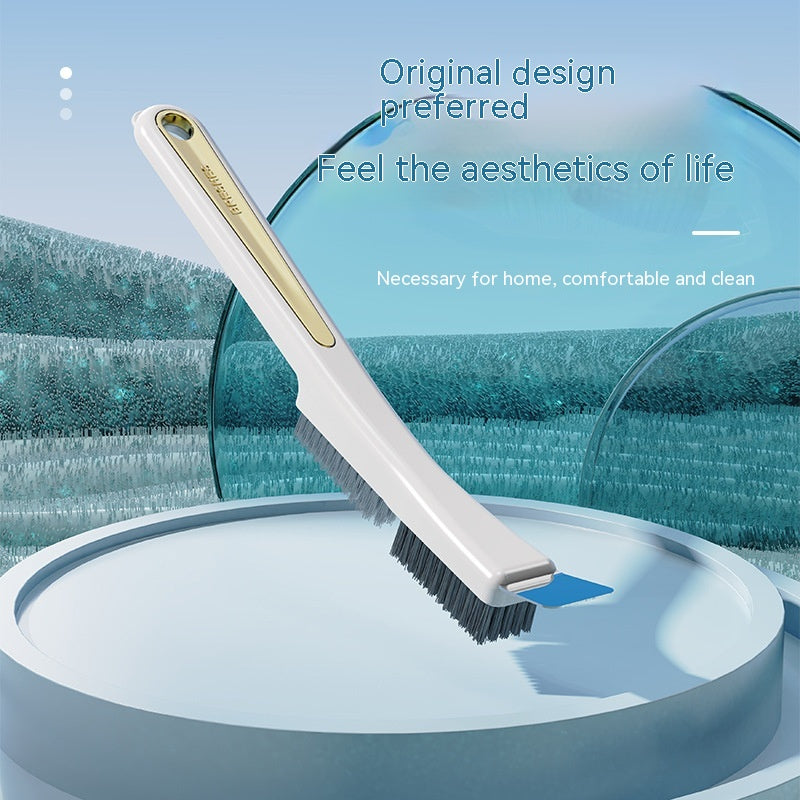 Cream-white crevice cleaning brush with bristles and scraper edge