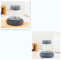 Two gray soap-dispensing palm scrubbers with different cleaning surfaces